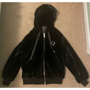 A nice fur jacket that is soft and comfortable for fashion wise